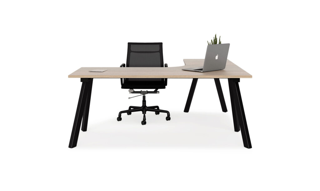 Front view of black Envy corner desk module with task seat and laptop