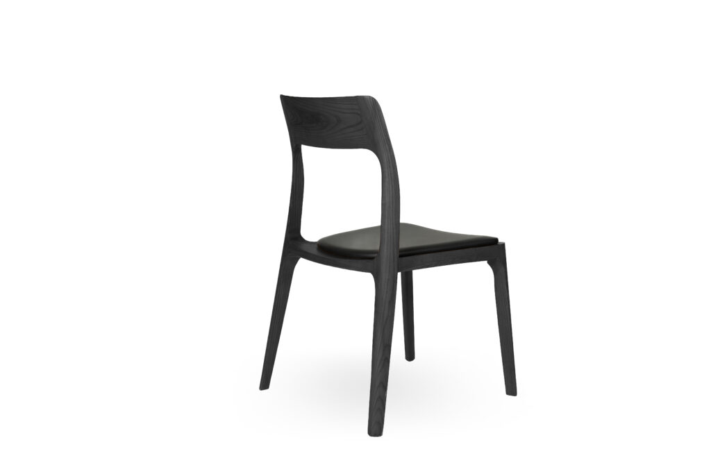 3/4 back of Black Stained Juna Visitor and Training Chair